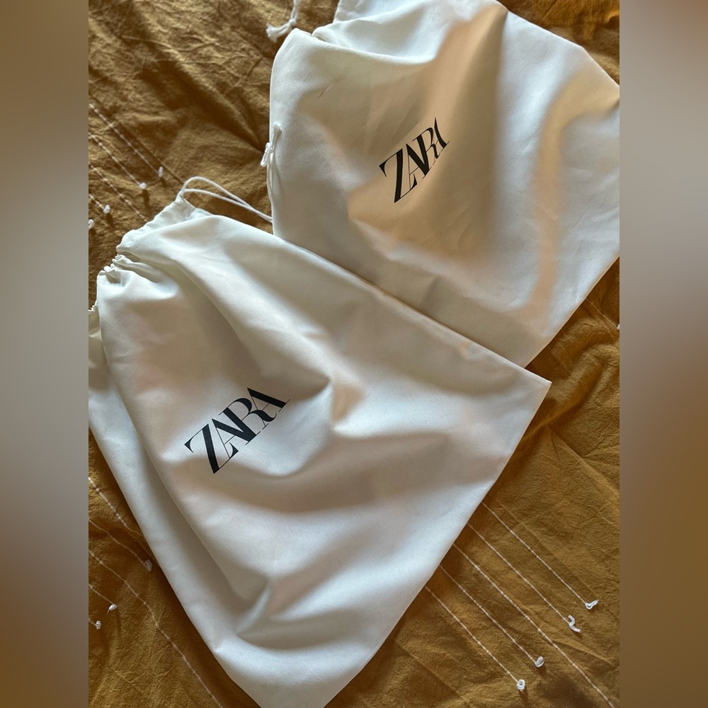 Two Zara drawstring gifts bags